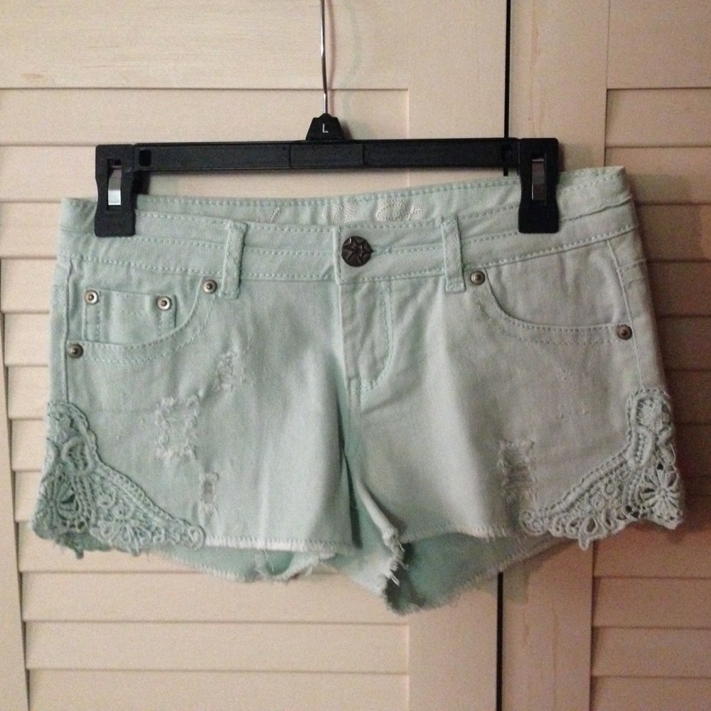 Mint Green distressed denim shorts
